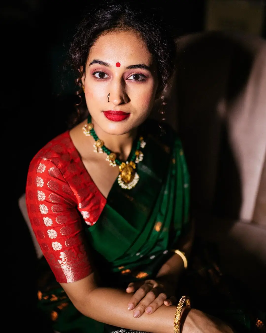 Pooja Ramachandran Stills in Green Saree Red Blouse